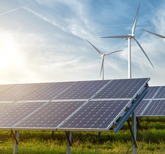 solar panels and wind generators under blue sky on sunset Clean Energy
